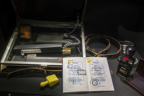 Passport with visas for West-Berlin and FRG and ID check kit including UV control apparatus used by