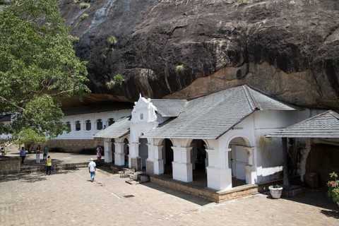 People at Dambulla cave Buddhist temple complex, Sri Lanka, Asia