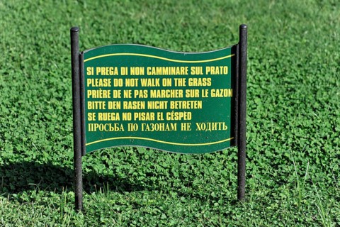 Sign with 6 languages, Please do not enter the lawn, Vatican Museums courtyard, Vatican, Rome,