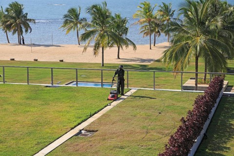 Amaya Beach Resort and Spa hotel, Pasikudah Bay, Eastern Province, Sri Lanka, Asia staff tending