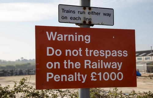 Do not trespass on the railway sign, Woodbridge, Suffolk, England, UK