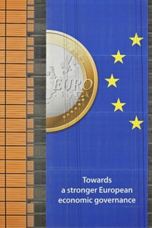 Banner about the euro hanging from the Berlaymont building of the European Commission, executive