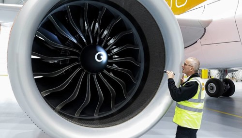 Olaf Gross, Licence Engineer at easyJet, checks the engine of an Airbus A320 Neo in front of the