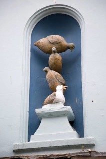 Bird sculpture of pigeons and seagull, Arwenack Street, Falmouth, Cornwall, England, UK