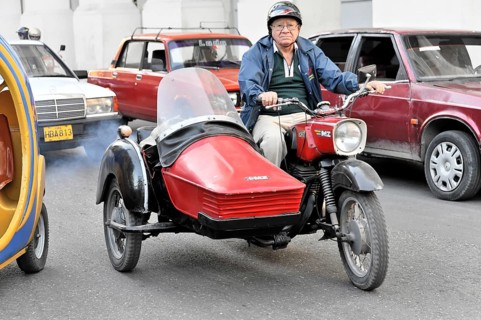 Motorcyclist in the centre of Havana, Centro Habana, Cuba, Greater Antilles, Caribbean, Central