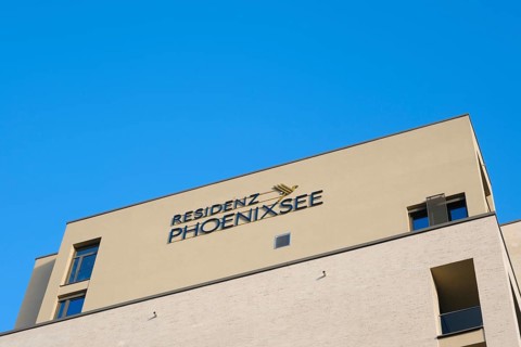 Building with lettering and logo Residenz Phoenixsee, Hoerde, Dortmund, Ruhr area, Westphalia,