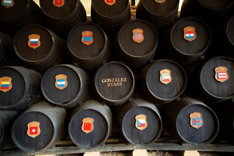 Oak barrels with national symbols of countries exported to from Gonzalez Byass bodega, Jerez de la