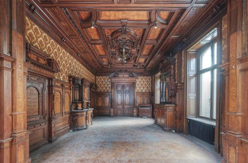Room with ornate wood carvings on the ceiling and walls, window provides natural light, Villa