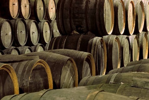 Wooden barrels in storage cellar of brewery with the Belgian beer Geuze, Belgium, Europe