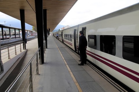Train awaiting departure on platform at railway station, Algeciras, Cadiz province, Spain, Europe