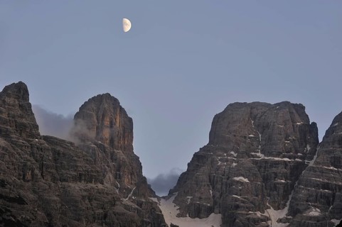Moon over the mountain Monte Cristallo in the Dolomites, Italy, Europe