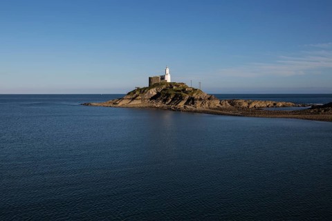 Lighthouse at Mumbles Head, Gower peninsula, near Swansea, South Wales, UK