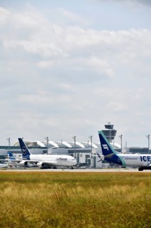 Lufthansa Airbus A380-800 with Iceland Air in front of Terminal 2, Munich Airport, Upper Bavaria,