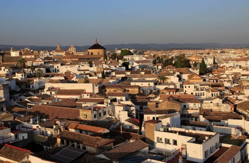 Oblique raised angle view of historic city centre buildings, Cordoba, Spain, Europe