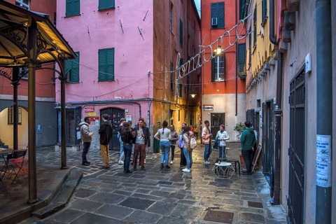 Meeting of students in the square of a historic wash house, Piazza Truogoli di Santa Brigida,