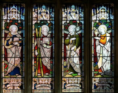 Stained glass window of four saints c 1906, church of Saint Nicholas, Biddestone, Wiltshire,