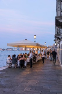 Restaurant on the waterfront of the Guidecca Canal, Dorsoduro district, Venice, Veneto, Italy,