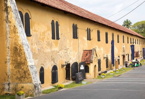 Motorised rickshaw at fort doorway exit in the historic town of Galle, Sri Lanka, Asia