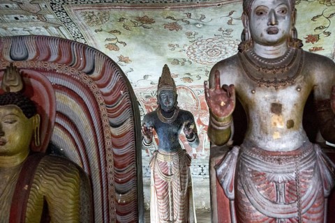 Buddha figures inside Dambulla cave Buddhist temple complex, Sri Lanka, Asia