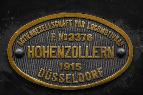 Brass factory plate of the 'Actiengesellschaft fuer Locomotivbau Hohenzollern' from 1915,