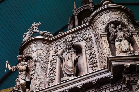 Renaissance-style carved canopy of the baptismal font, Enclos Paroissial enclosed parish of