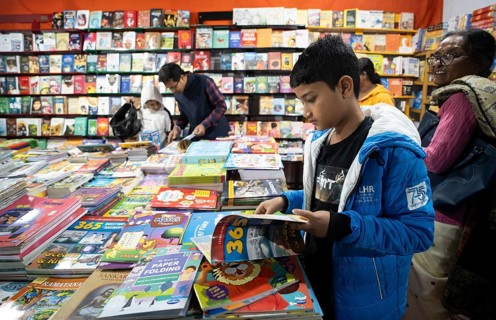 Book readers browsing books at a stall during Assam Book Fair, in Guwahati, Assam, India on 29