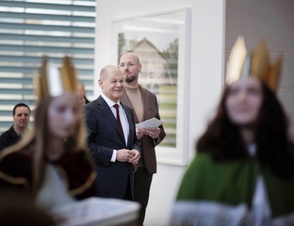 Federal Chancellor Olaf Scholz (SPD) pictured at the traditional reception for carol singers at the