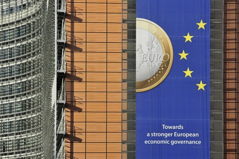 Banner about the euro hanging from the Berlaymont building of the European Commission, executive