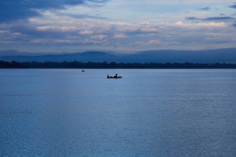 Fishing canoes in calm lake water Polonnaruwa, North Central Province, Sri Lanka, Asia