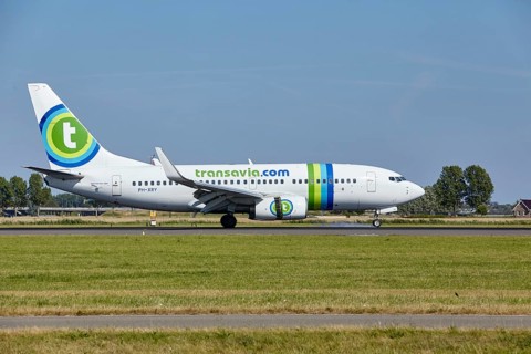Transavia Boeing 737-7K2 with registration PH-XRY lands on the Polderbaan, Amsterdam Schiphol
