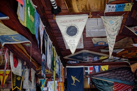 Colourful flags and pennants from Atlantic crossings hang from the ceiling of the famous Cafe