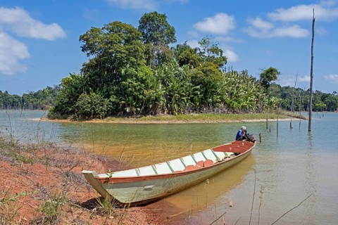 Wooden tourist boat at Brokopondo reservoir, Brokopondostuwmeer, artificial lake created by