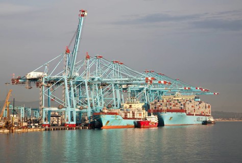 Large cranes at APM Terminals loading container ships port at Algeciras, Cadiz Province, Spain,