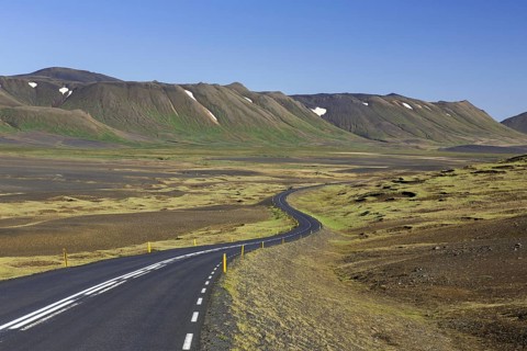 Empty Route 1, Ring Road, winding national road in desolate barren landscape in summer at