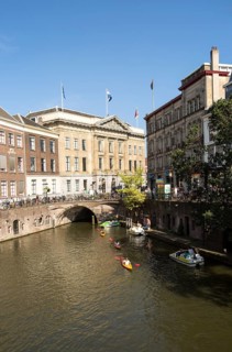 People kayaking near the Stadhuis, Oudegracht canal, Utrecht, Netherlands