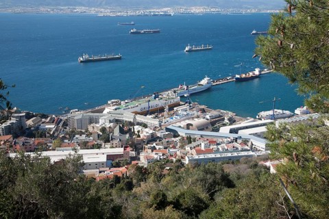View over docks and shipyard warehouses in Gibraltar, British territory in southern Europe