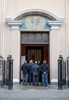 People spilling outside during a funeral at Cathedral of St. Mary the Crowned, Gibraltar, British