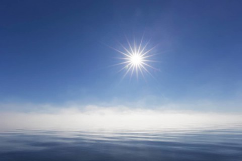 Midnight sun over the Arctic Ocean, north of the Arctic Circle at Nordaustlandet, Svalbard,