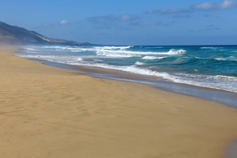 Fuerteventura beach on west coast of Jandia peninsula in front of abandoned village of Cofete with