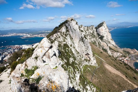 Sheer white rock mountainside the Rock of Gibraltar, British territory in southern Europe