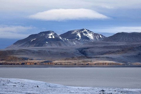 View over mountains and sea at Krossfjorden, Svalbard, Spitsbergen, Norway, Europe