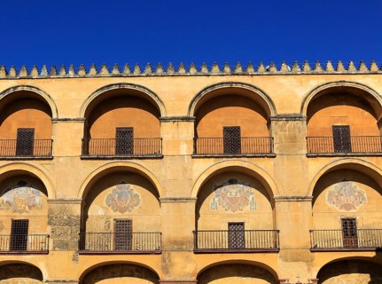 Symmetrical pattern of balconies in the historic Great Mosque Mezquita complex of buildings,