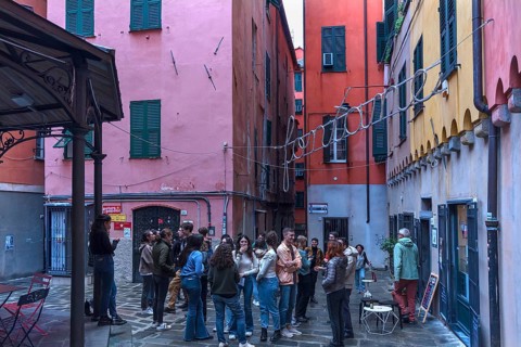 Meeting of students in the square of a historic wash house, Piazza Truogoli di Santa Brigida,