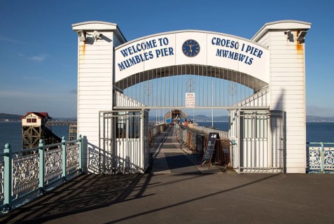 Pier and lifeboat station, Mumbles, Gower peninsula, near Swansea, South Wales, UK