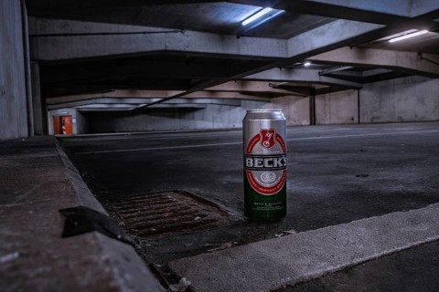 A Beck's beer can in the foreground in a gloomy car park, Pforzheim, Germany, Europe