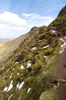 Striding Edge arete and Helvellyn mountain peak, Lake District, Cumbria, England, UK