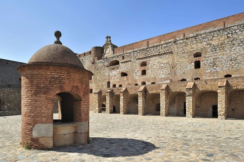 Inner court and well of the Catalan fortress Fort de Salses at Salses-le-Chateau, Pyrenees, France,