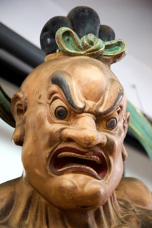 Close up of angry Buddha face Gangaramaya Buddhist Temple, Colombo, Sri Lanka, Asia