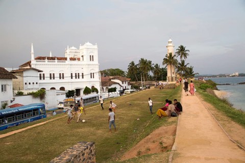 Fort ramparts of historic town of Galle, Sri Lanka, Asia with lighthouse and Meeran Jumma mosque,