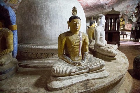 Buddha figures inside Dambulla cave Buddhist temple complex, Sri Lanka, Asia